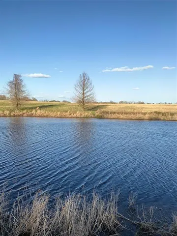 a view of a lake with houses