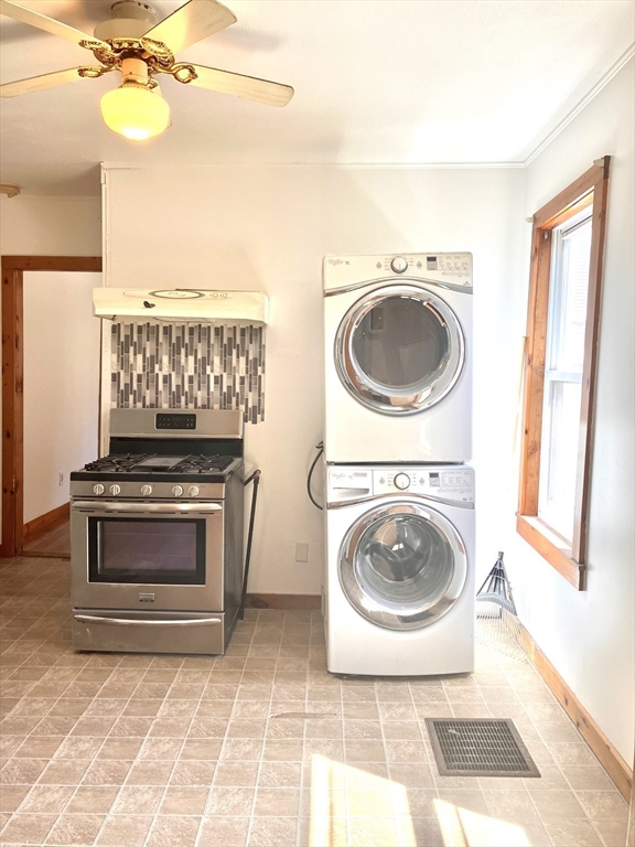 4 Sisson Terrace, Unit 1 Lynn, MA 01902 - Photo 7 of 16 a view of a kitchen with washer and dryer