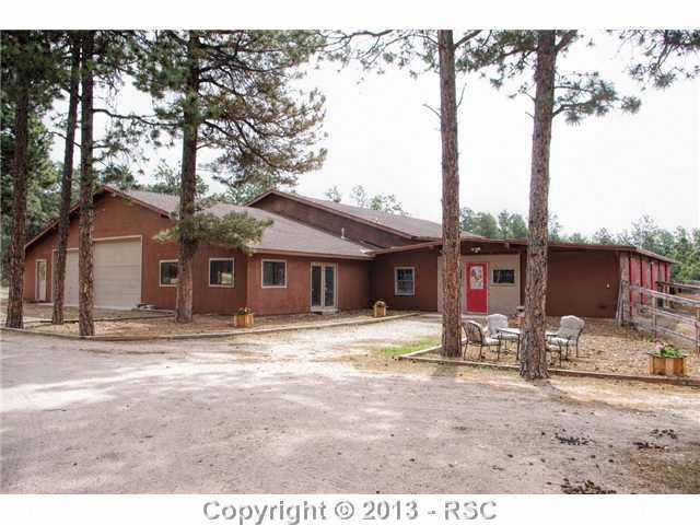 4425 Shoup Road Colorado Springs, CO 80908 - Photo 20 of 25 Fully finished garage, workshop and barn!
