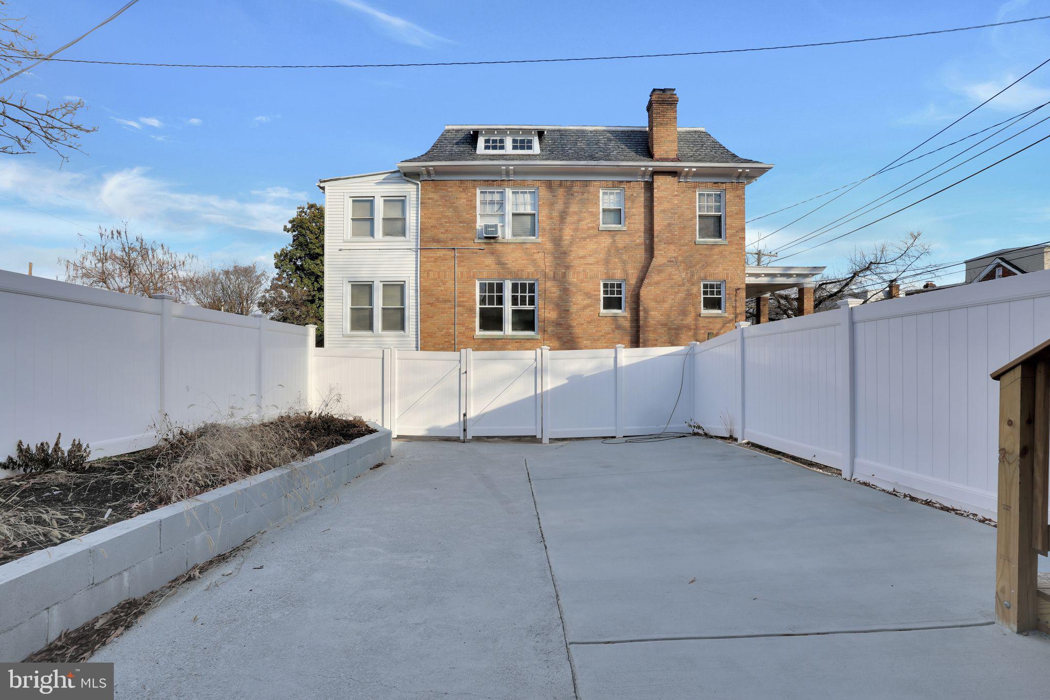 5803 5th Street Northwest Washington, DC 20011 - Photo 52 of 57 a front view of a house with a yard