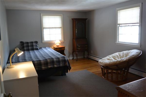 6 Hancock Road Needham, MA 02492 - Photo 13 of 19 a bedroom with a bed and a window
