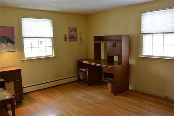 6 Hancock Road Needham, MA 02492 - Photo 14 of 19 an empty room with a window and wooden floor