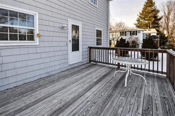 6 Hancock Road Needham, MA 02492 - Photo 16 of 19 a view of a balcony with wooden floor and fence