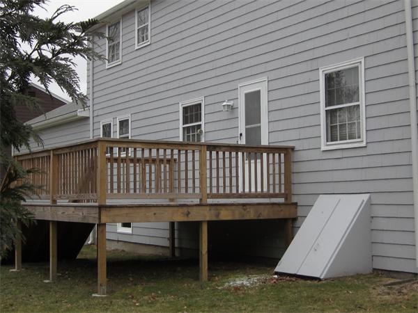 6 Hancock Road Needham, MA 02492 - Photo 17 of 19 a view of a house with a deck
