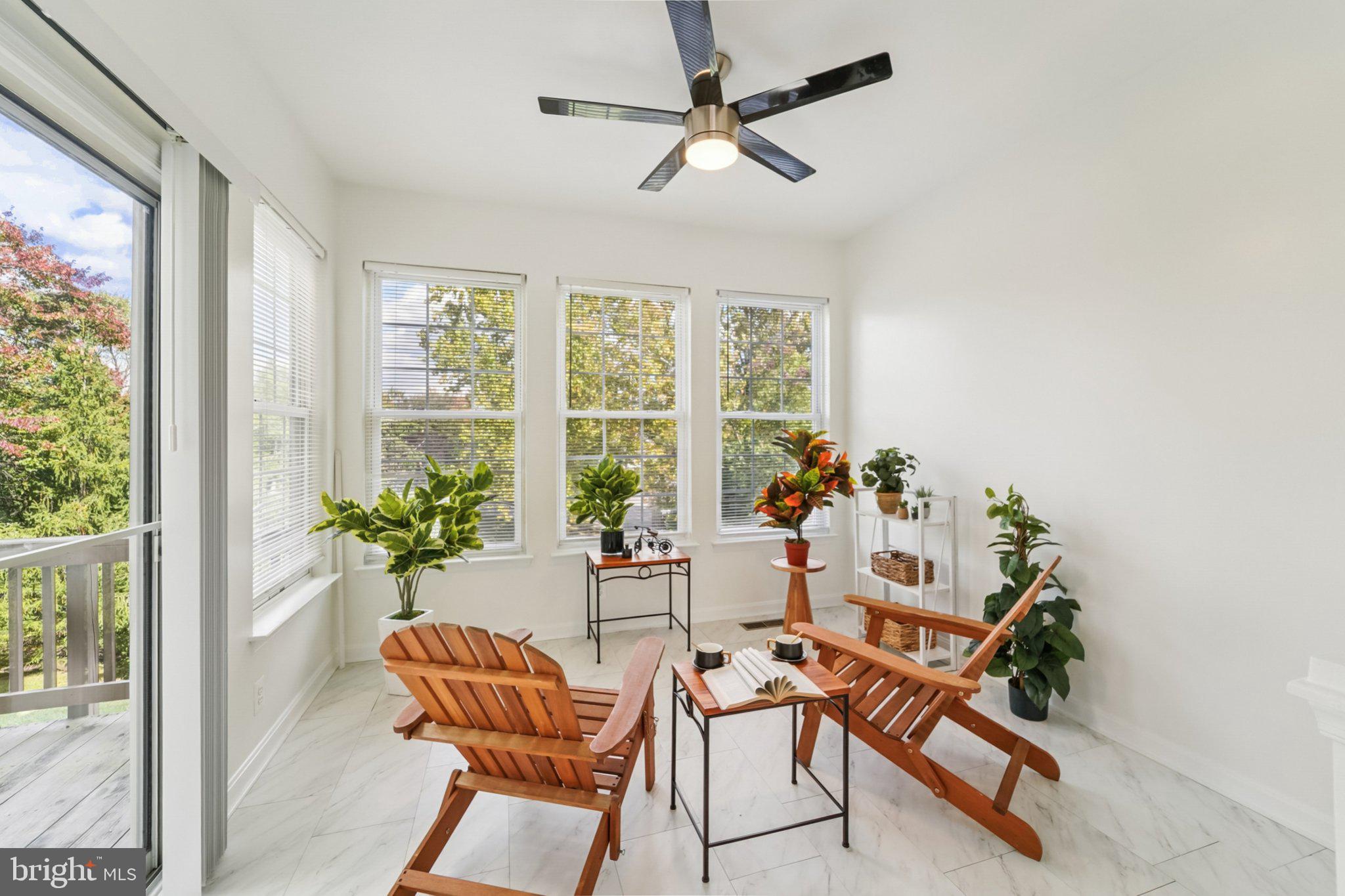 1007 Carbondale Way Crofton, MD 21114 - Photo 14 of 24 a living room with furniture and a potted plant