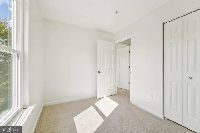 an empty room with windows