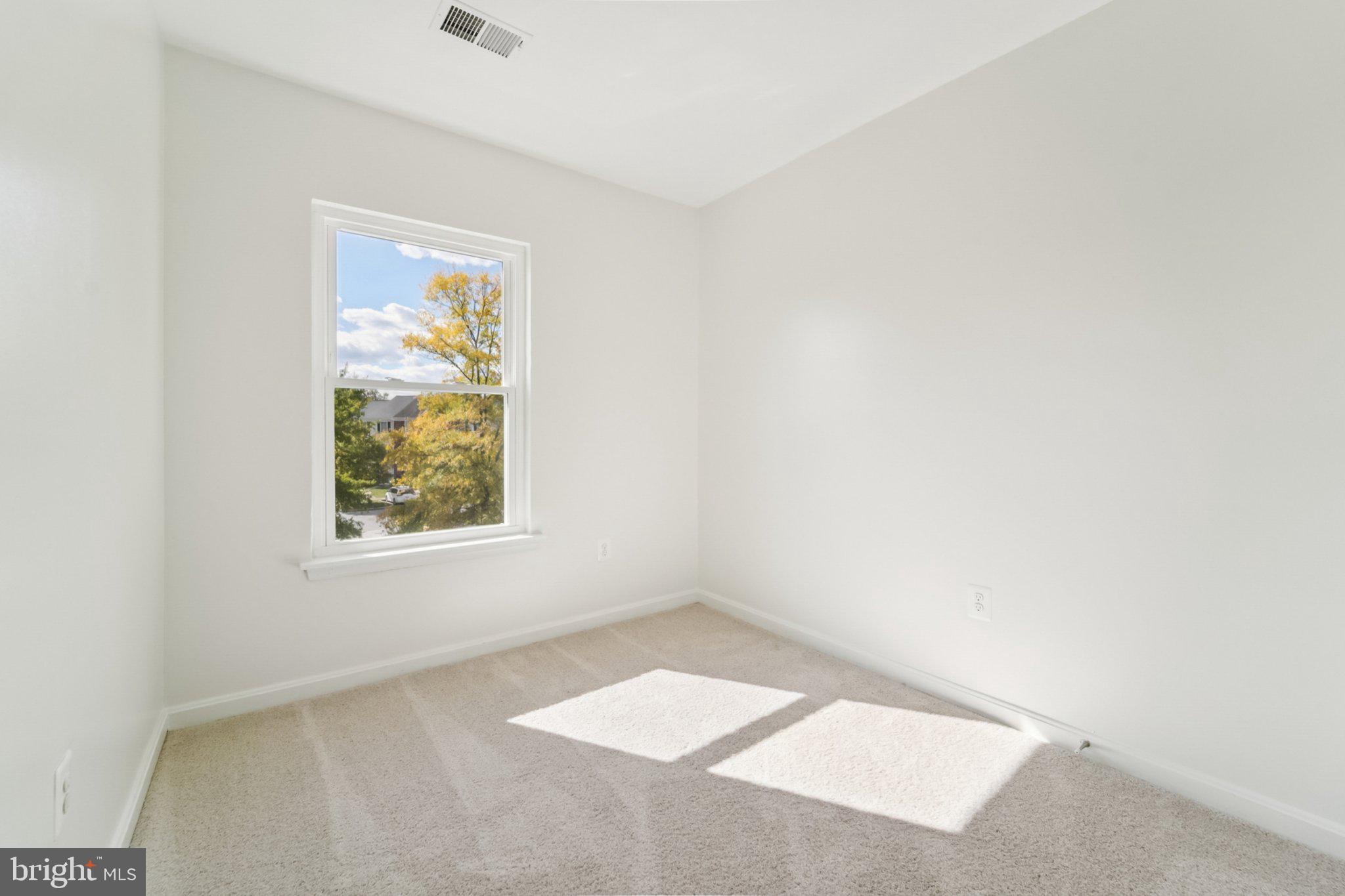1007 Carbondale Way Crofton, MD 21114 - Photo 21 of 24 an empty room with windows