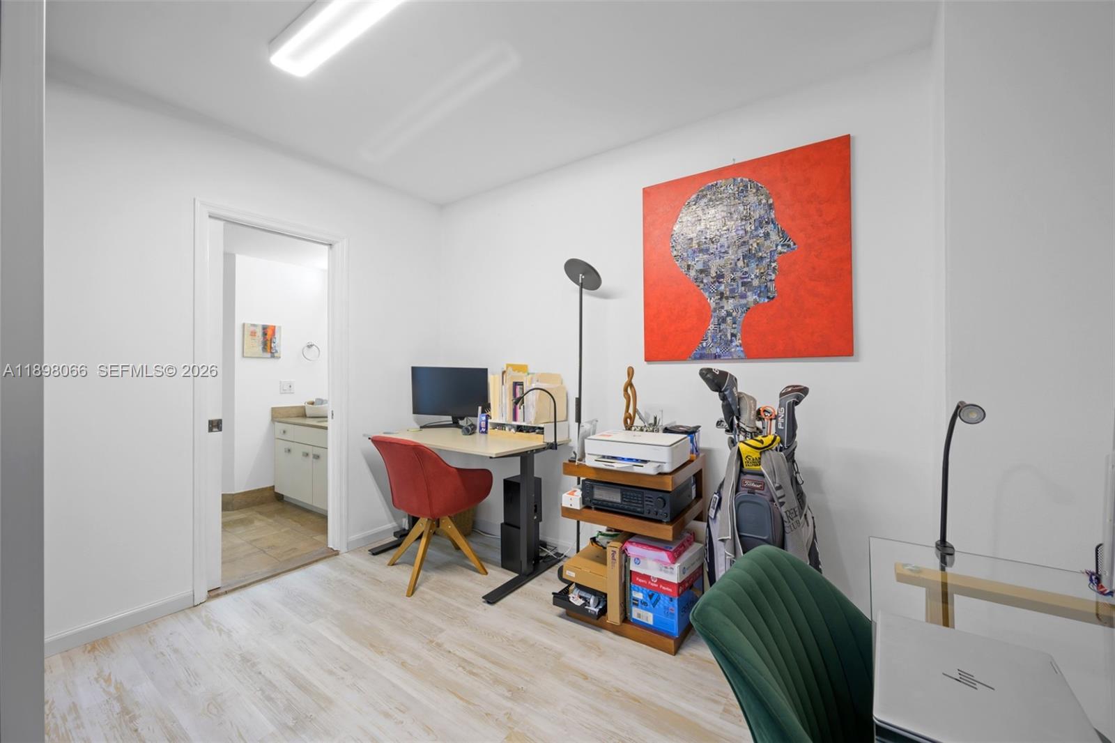 1581 Brickell Avenue, Unit 2005 Miami, FL 33129 - Photo 20 of 38 a workspace with furniture and window