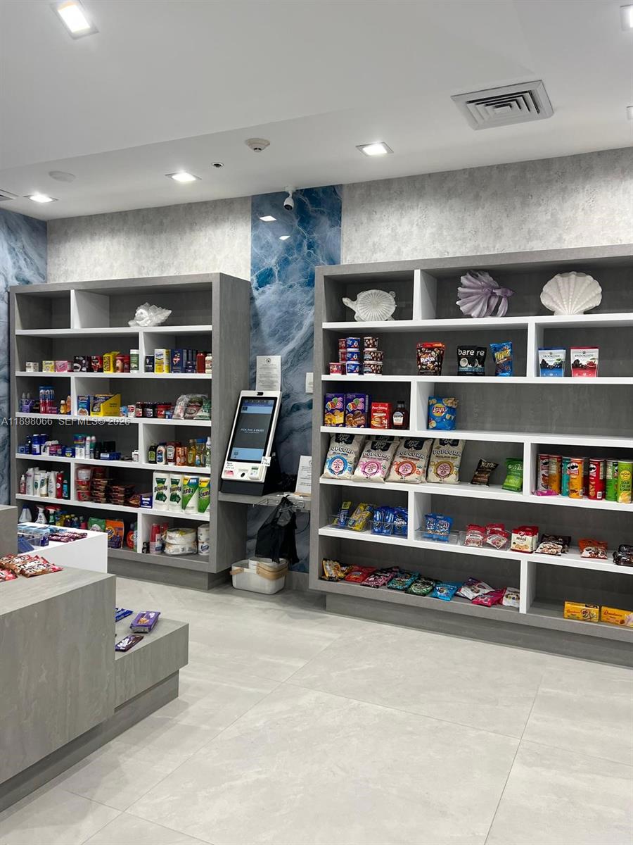 1581 Brickell Avenue, Unit 2005 Miami, FL 33129 - Photo 37 of 38 a view of empty room with shelves