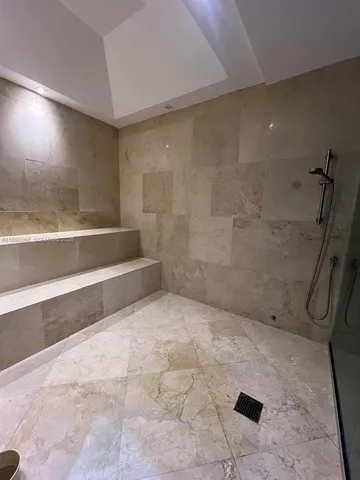 a view of empty room with shelves