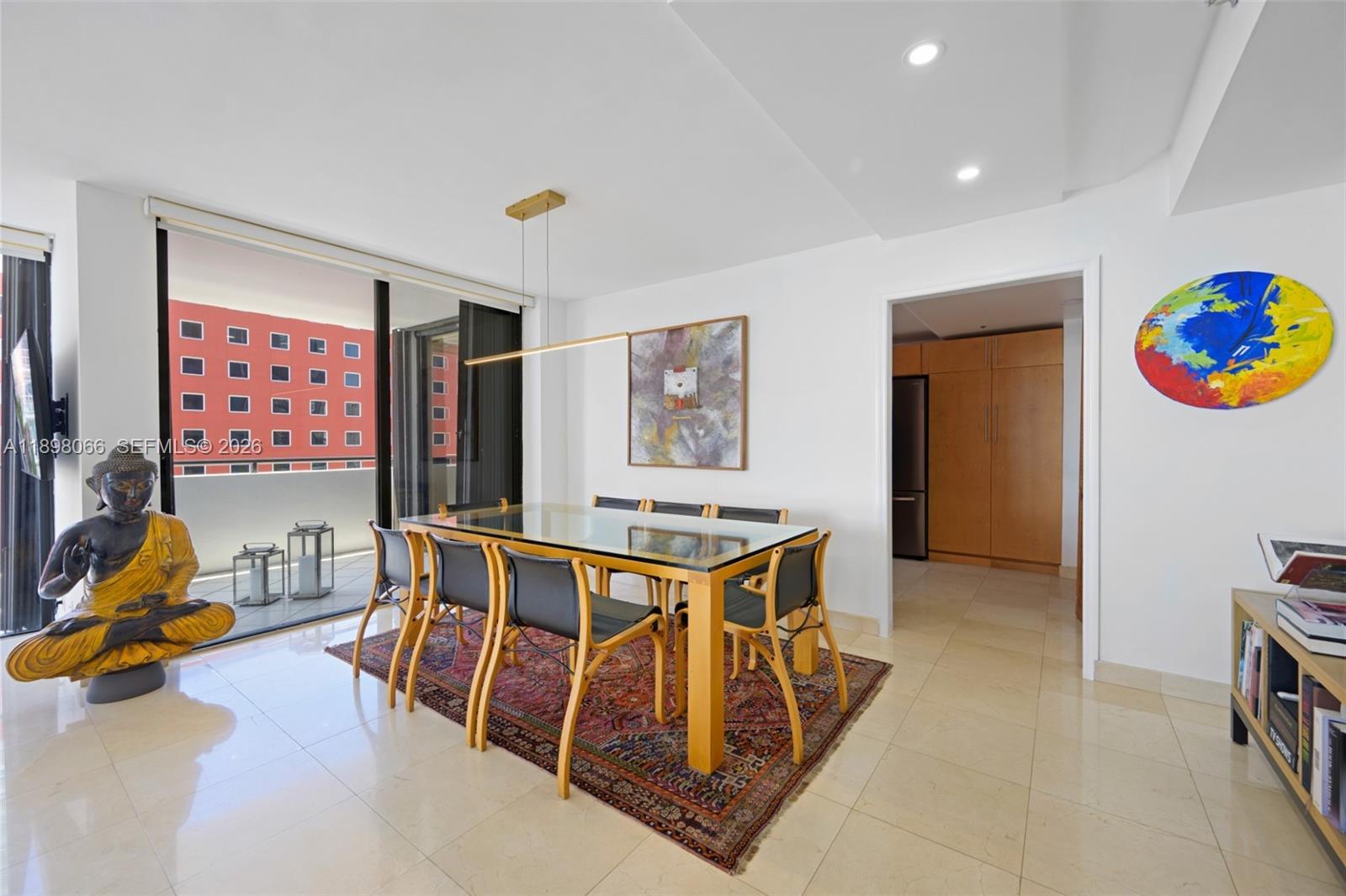 1581 Brickell Avenue, Unit 2005 Miami, FL 33129 - Photo 7 of 38 a living room with furniture a air conditioner vent and a window