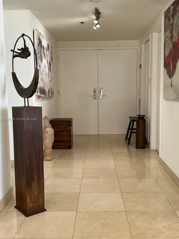 a view of kitchen and wooden floor