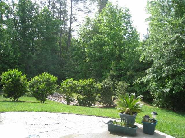 3406 Baton Road Raleigh, NC 27610 - Photo 2 of 12 TREES! and everything is cared for by the HOA. Privacy and GREEN!