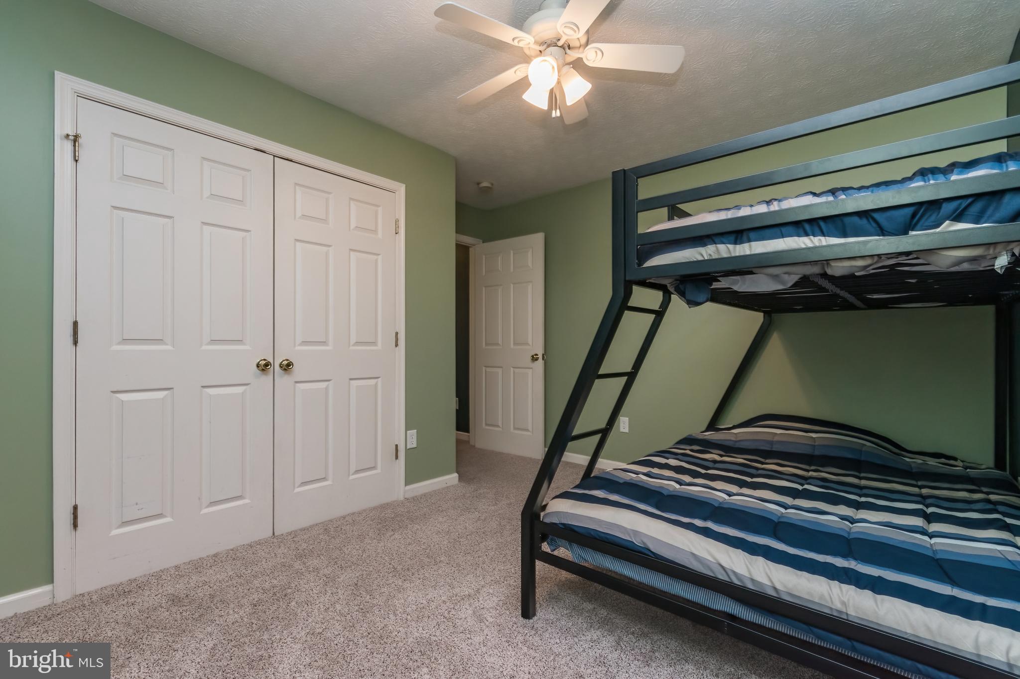 5630 Crooked Run Road Basye, VA 22810 - Photo 46 of 67 a view of room with stairs and a chandelier fan