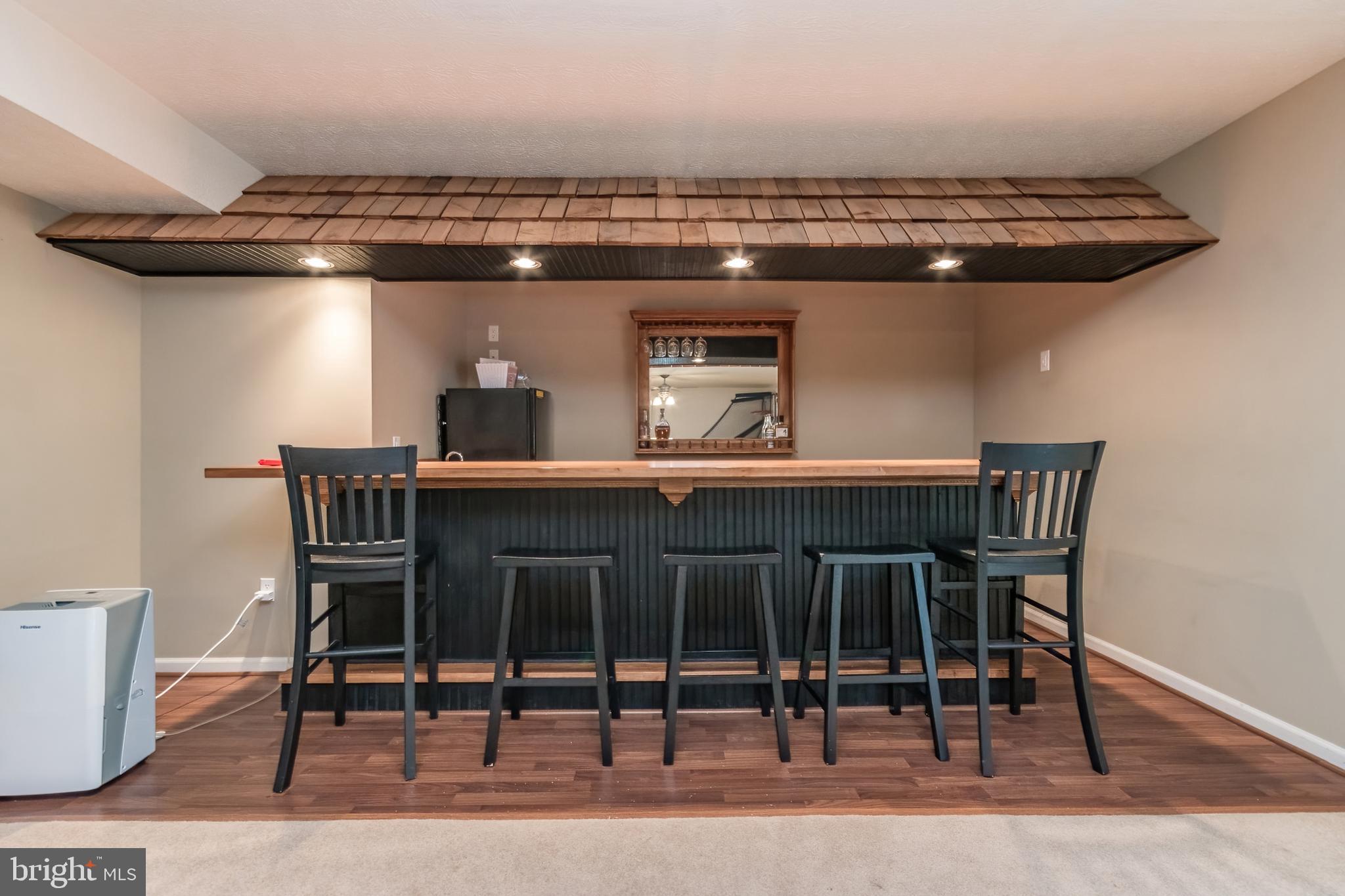 5630 Crooked Run Road Basye, VA 22810 - Photo 54 of 67 a view of a dining room with furniture and wooden floor