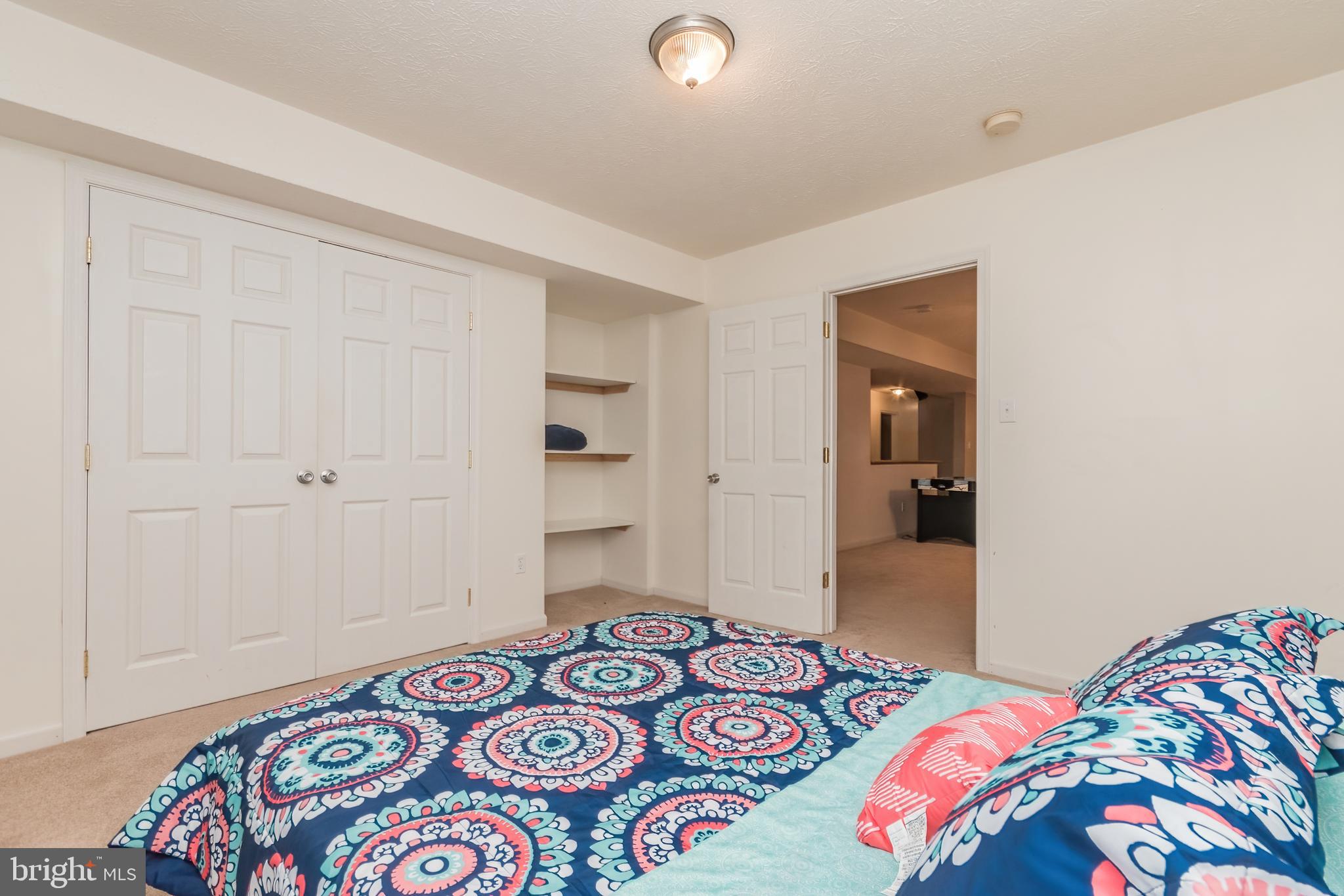 5630 Crooked Run Road Basye, VA 22810 - Photo 62 of 67 a bedroom with a bed and a dresser