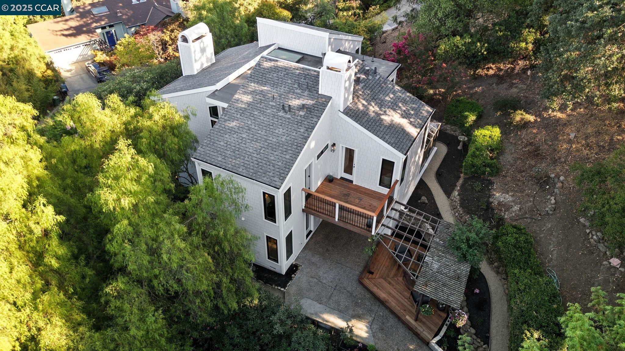189 Rudgear Drive Walnut Creek, CA 94596 - Photo 16 of 59 an aerial view of a house with a yard and garden