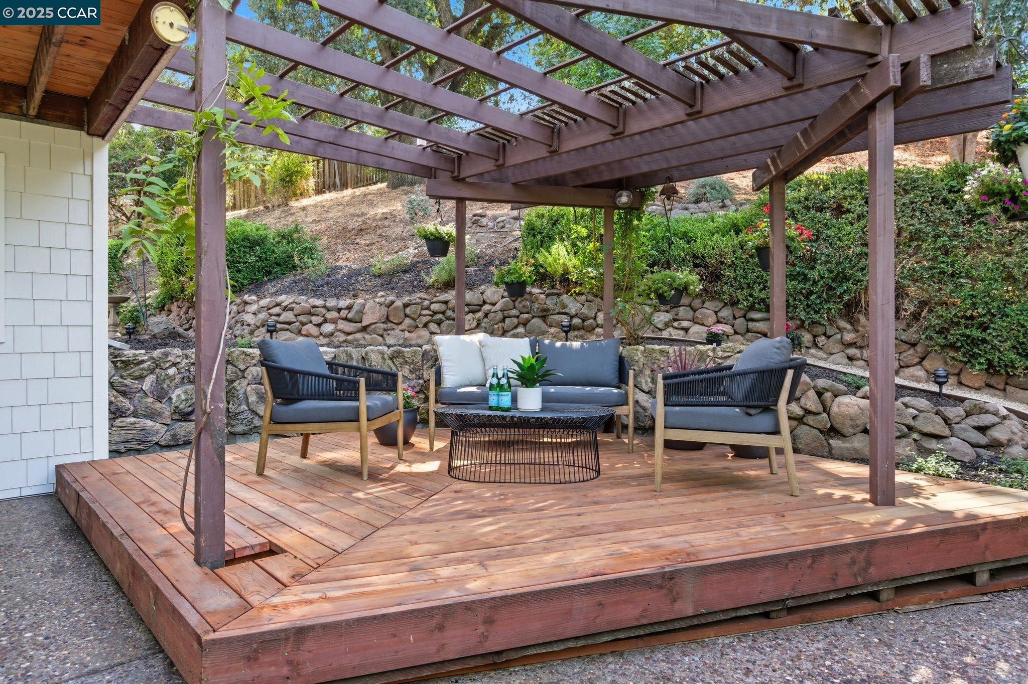 189 Rudgear Drive Walnut Creek, CA 94596 - Photo 22 of 59 a outdoor living space with furniture and a fireplace