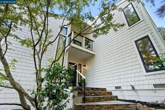 a view of a backyard of the house