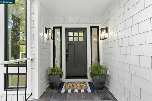 a view of a balcony with wooden fence and floor