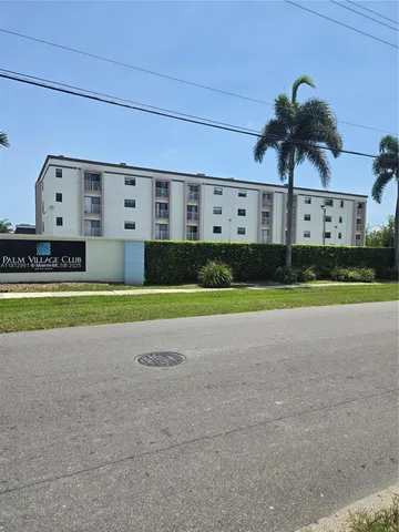 a view of swimming pool with outdoor seating and yard