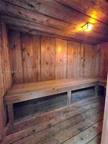a view of room with wooden floor