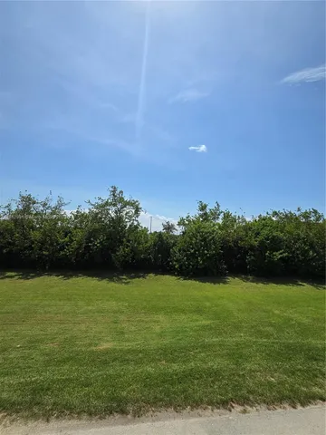 a view of swimming pool from a balcony