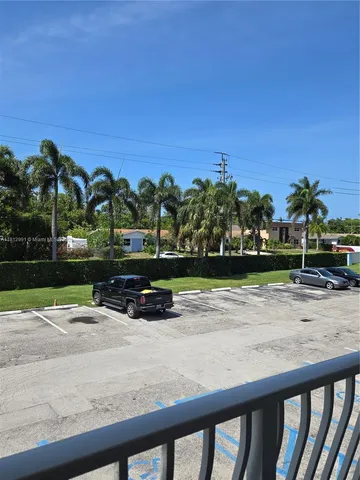 a view of a building with a road