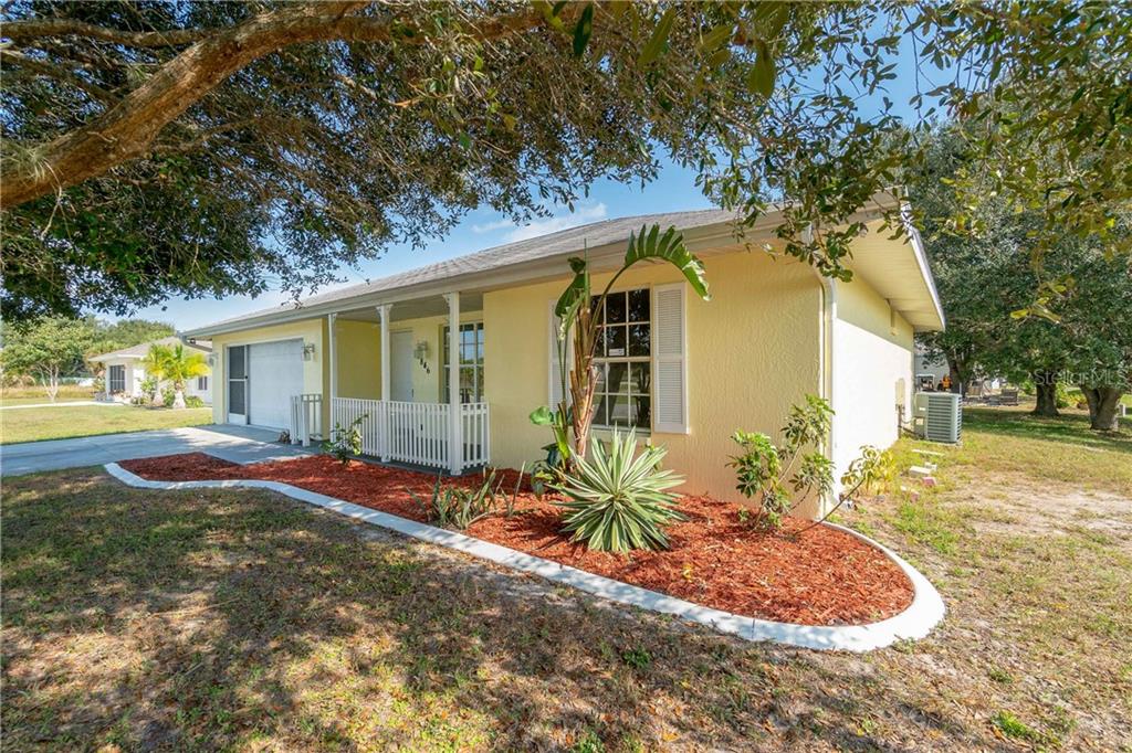 2846 Gisela Road North Port, FL 34287 - Photo 1 of 1 a front view of a house with garden