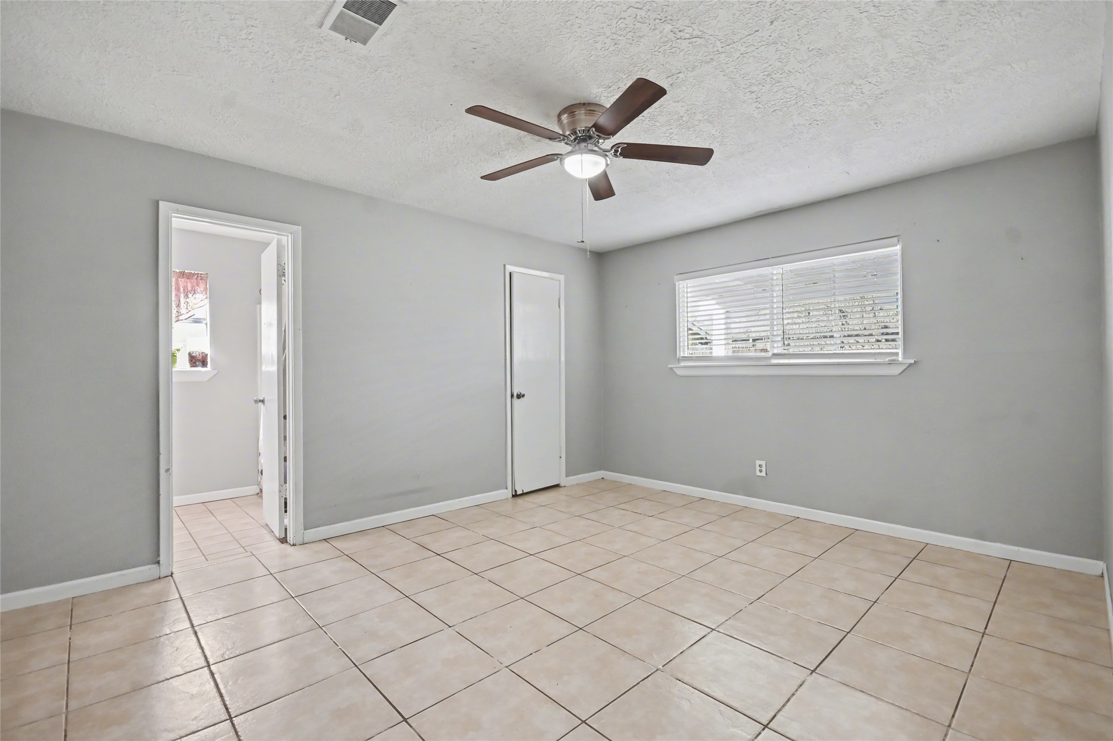4202 Townes Forest Road Friendswood, TX 77546 - Photo 12 of 17 a view of an empty room and window