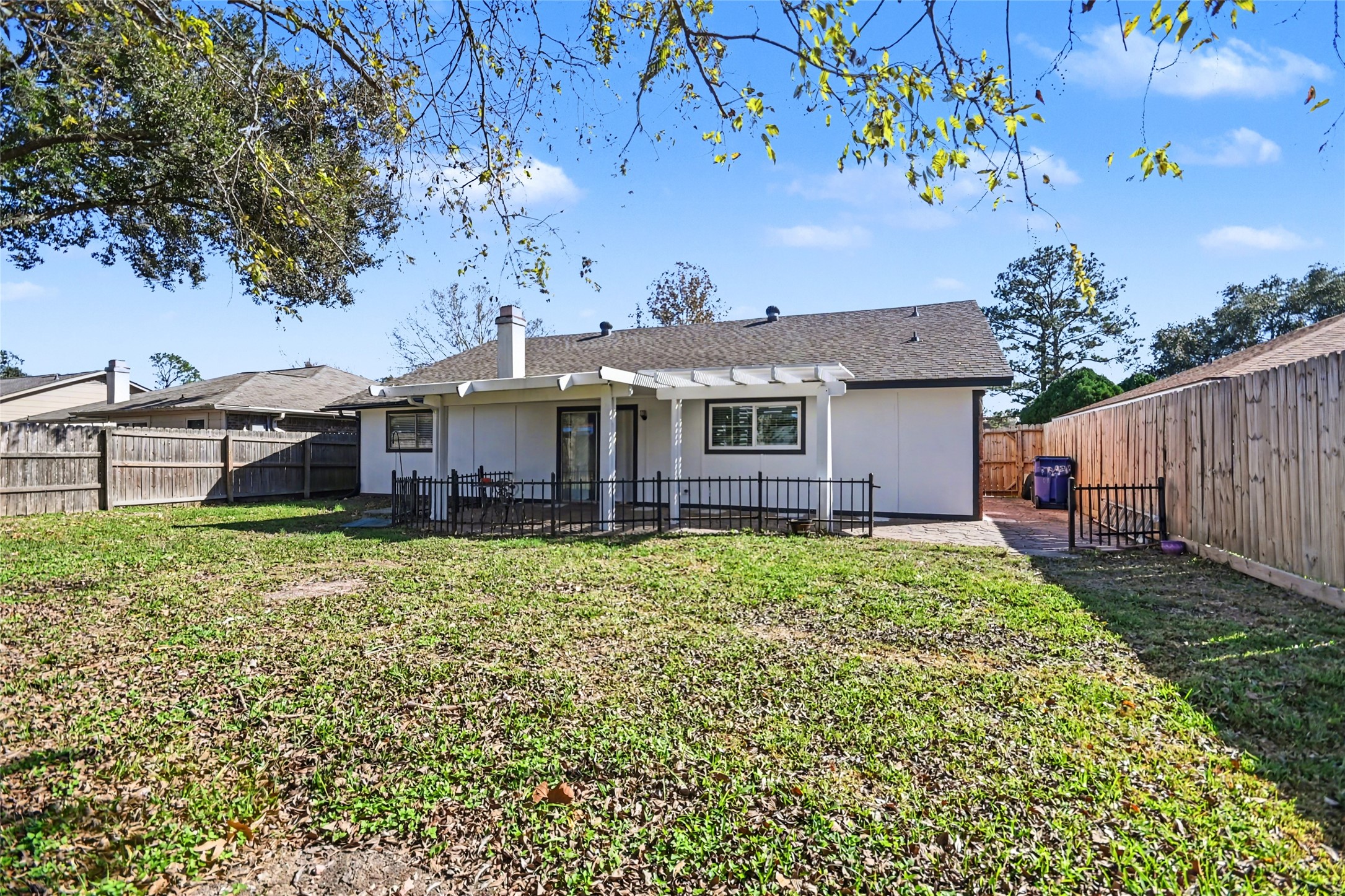4202 Townes Forest Road Friendswood, TX 77546 - Photo 15 of 17 a front view of a house with garden