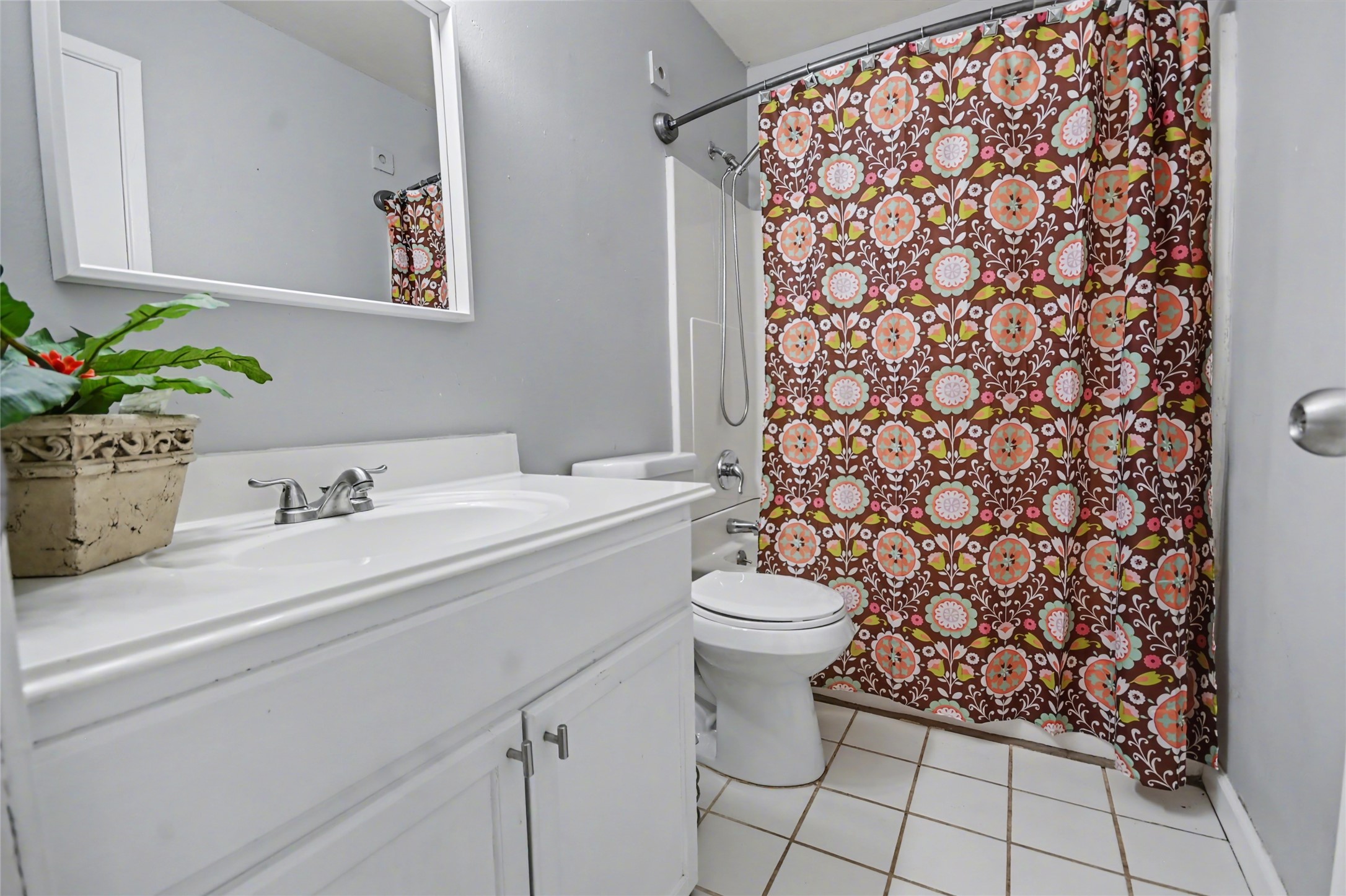 4202 Townes Forest Road Friendswood, TX 77546 - Photo 7 of 17 a bathroom with a sink toilet and shower