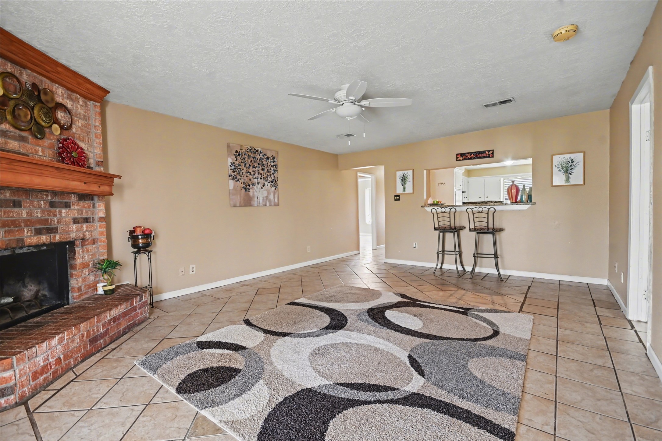 4202 Townes Forest Road Friendswood, TX 77546 - Photo 10 of 17 a dining room with furniture and wooden floor