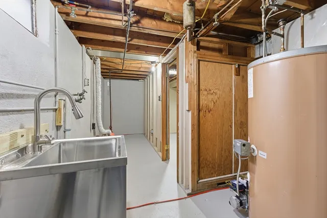 a bathroom with a sink and mirror