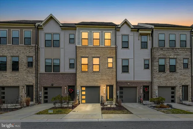 a front view of a building with windows
