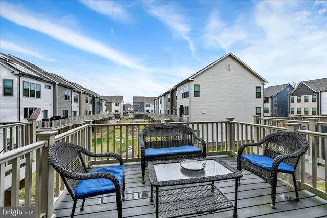 a bathroom with a double vanity sink toilet and a mirror