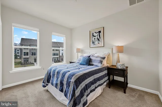 an aerial view of a house with a swimming pool