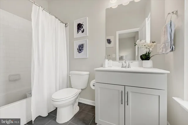 an aerial view of a house with a ocean view