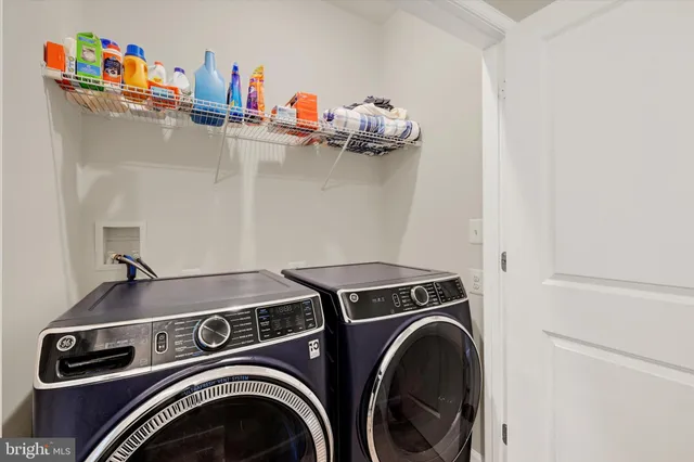 a view of swimming pool with outdoor seating and yard