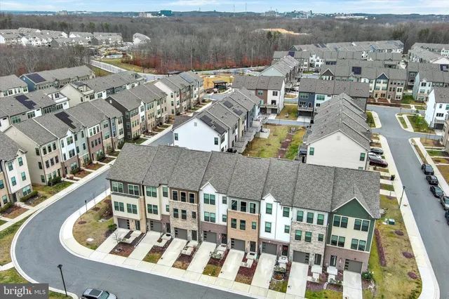 a view of a swimming pool with a table and chairs