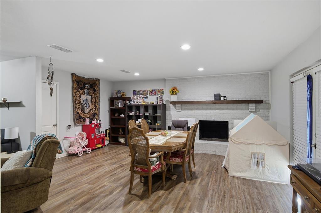 123 Harmon Road Gun Barrel City, TX 75156 - Photo 12 of 36 a view of a dining room with furniture and wooden floor
