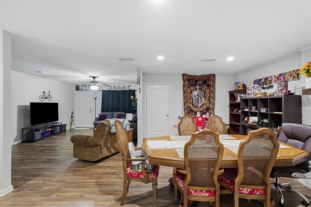 123 Harmon Road Gun Barrel City, TX 75156 - Photo 16 of 36 a living room with furniture and a flat screen tv