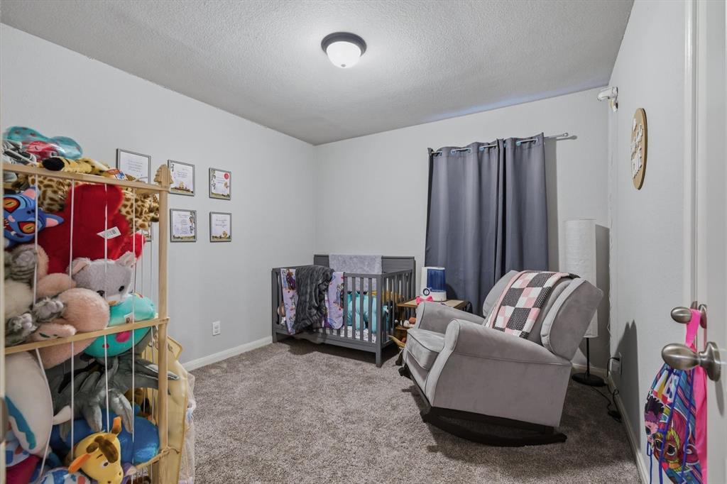 123 Harmon Road Gun Barrel City, TX 75156 - Photo 22 of 36 a living room with furniture and a couch