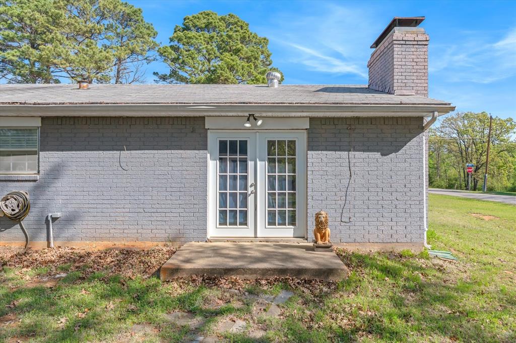 123 Harmon Road Gun Barrel City, TX 75156 - Photo 29 of 36 a front view of a house with a yard