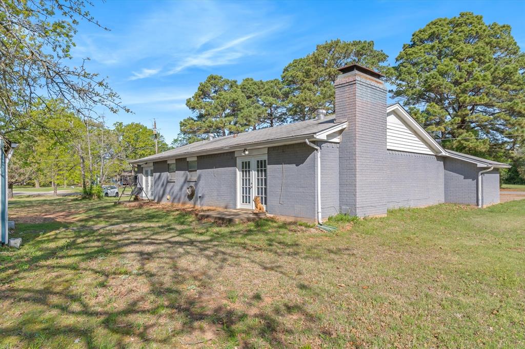 123 Harmon Road Gun Barrel City, TX 75156 - Photo 30 of 36 a backyard of a house