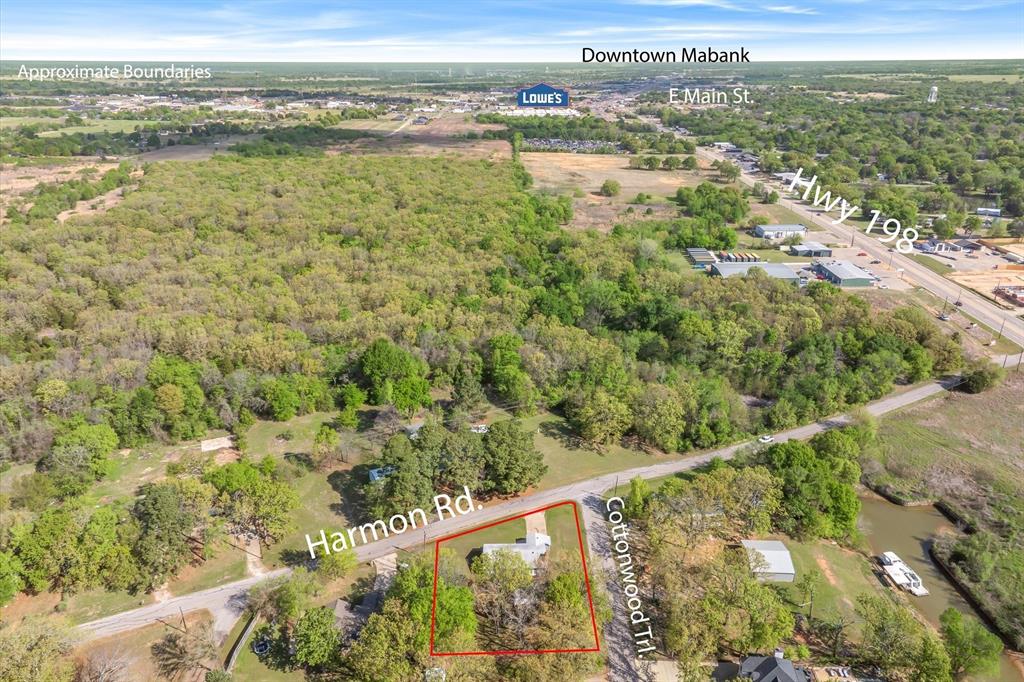123 Harmon Road Gun Barrel City, TX 75156 - Photo 3 of 36 a view of a lake from a balcony