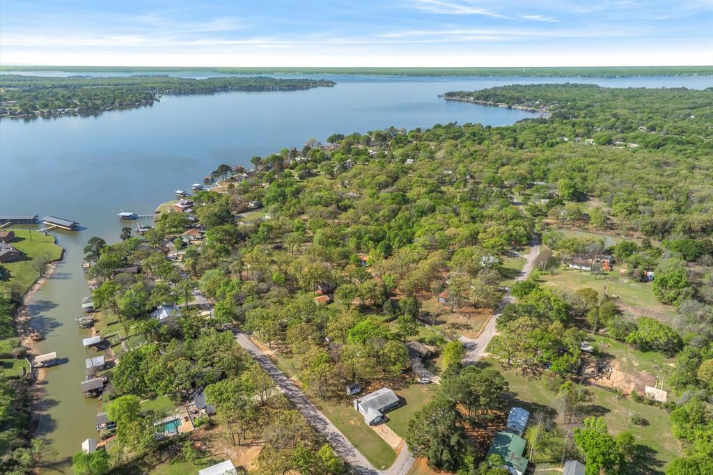 123 Harmon Road Gun Barrel City, TX 75156 - Photo 35 of 36 a view of a lake with a yard