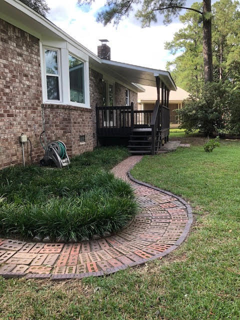 214 Lodgepole Road Ladson, SC 29456 - Photo 41 of 44 Walkway to Covered Porch