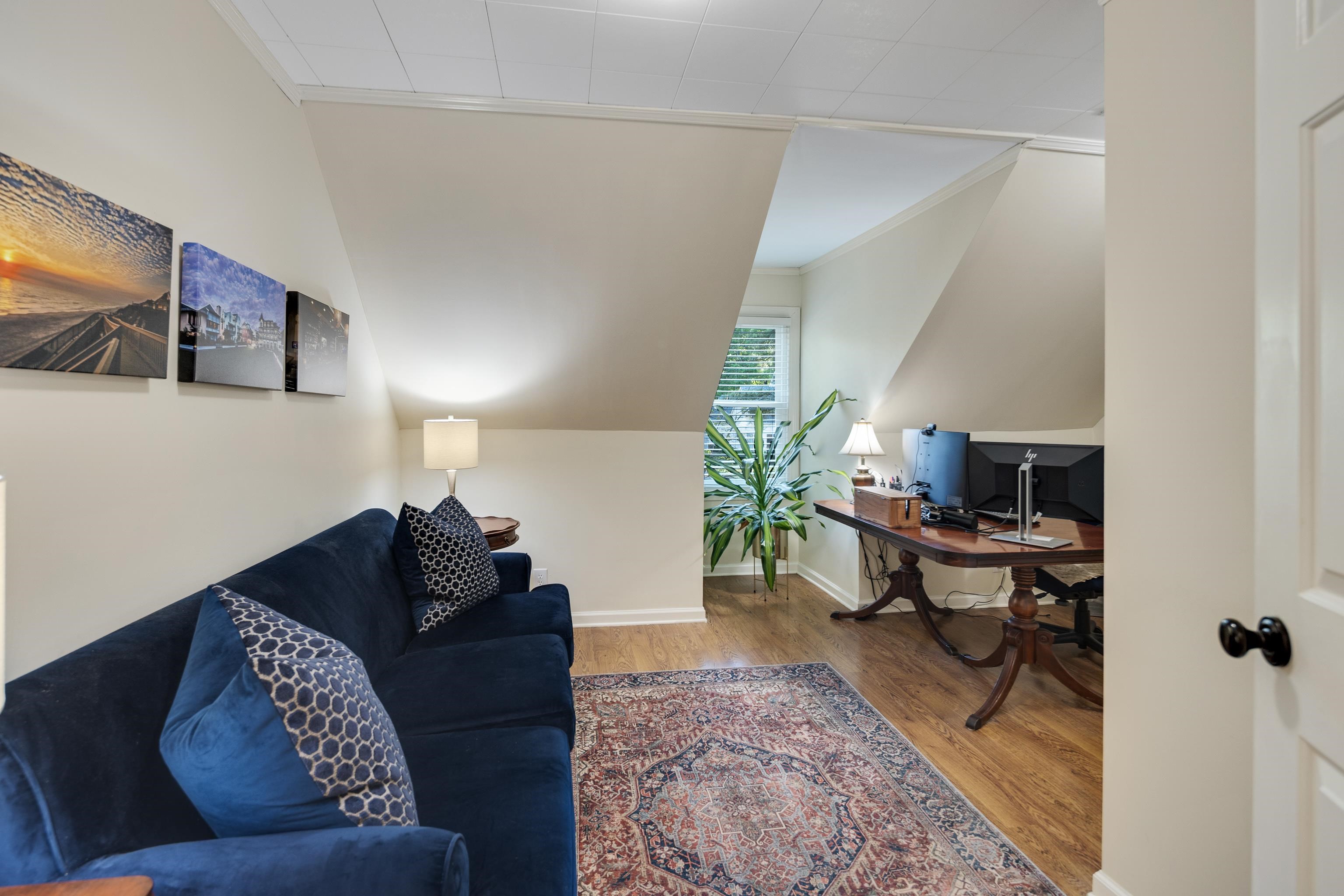 6326 East Shady Grove Road Memphis, TN 38120 - Photo 24 of 40 a living room with furniture and a rug