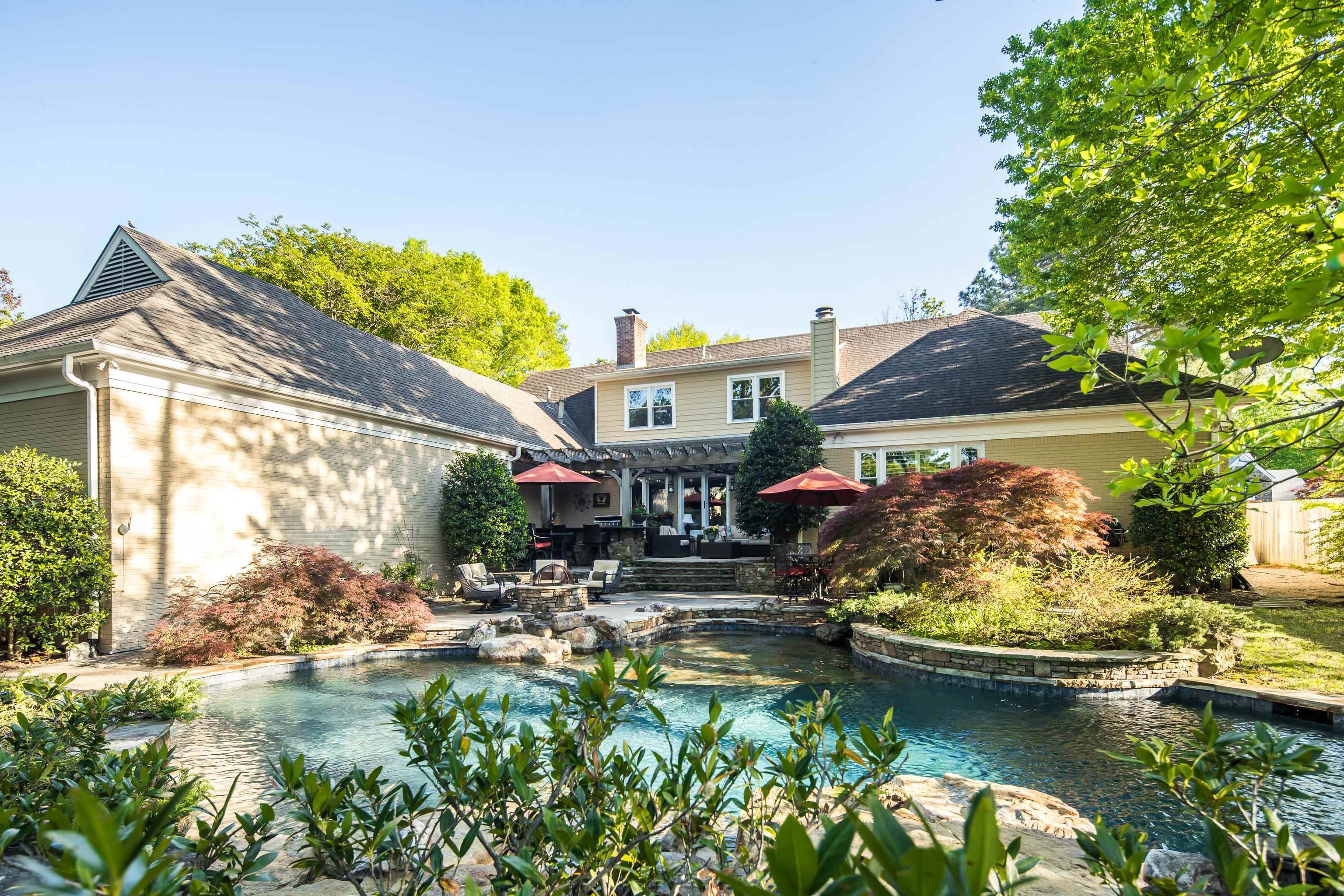 6326 East Shady Grove Road Memphis, TN 38120 - Photo 40 of 40 a house with river in front of it